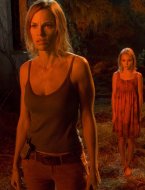 Hilary Swank and Friend face THE REAPING